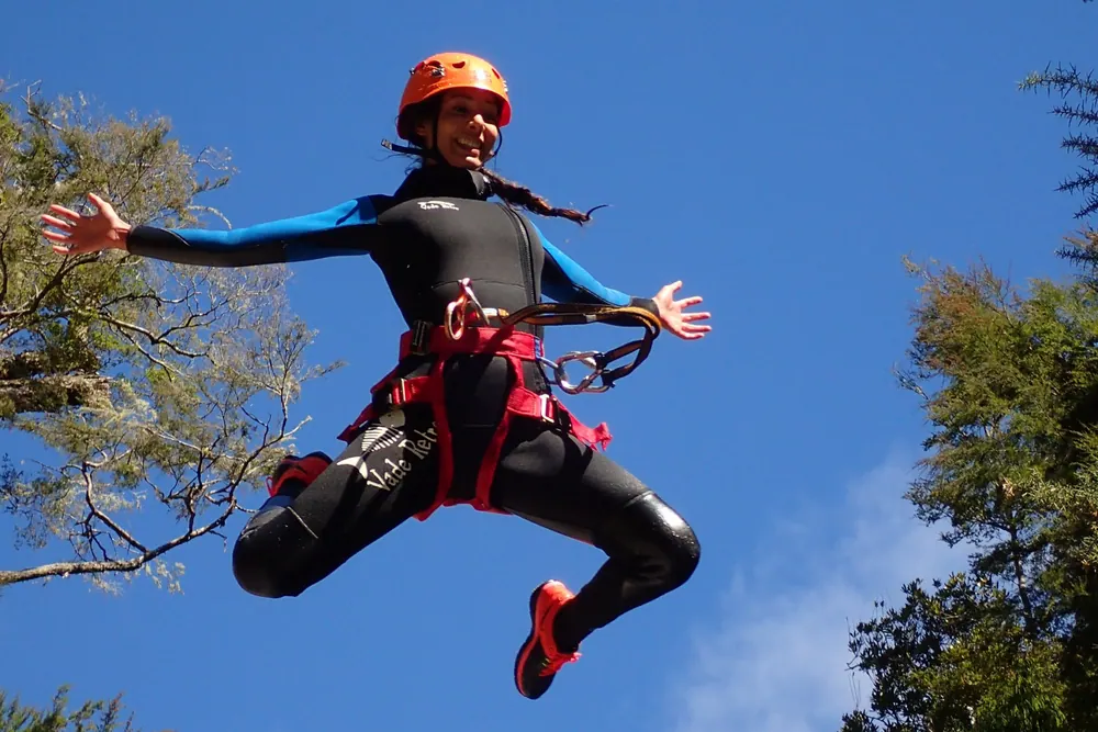 Canyoning photo shown in the operator’s NZ Explorer tour-page gallery; actual operator tour-page photo.