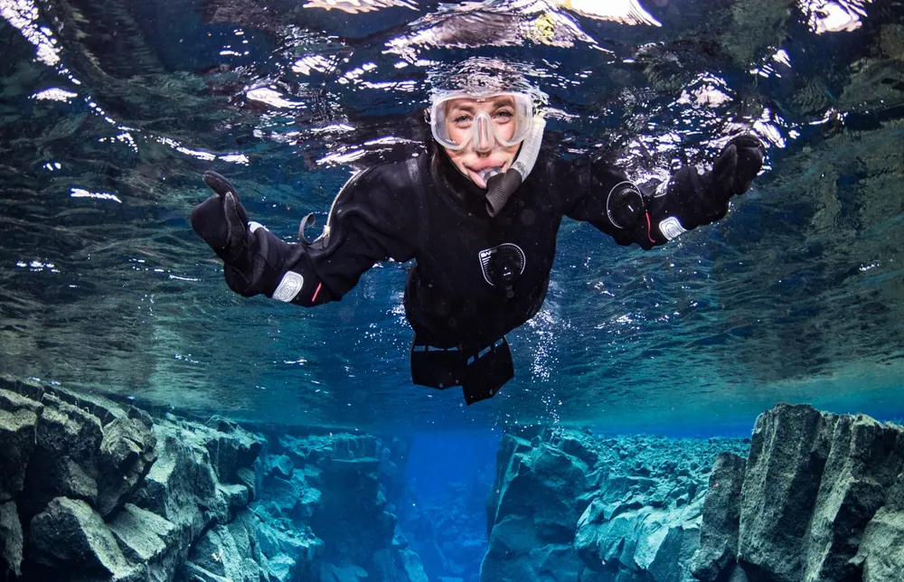 Official Silfra snorkeling tour image from DIVE.IS; representative of the activity, not verified as a photograph of a specific tour departure.
